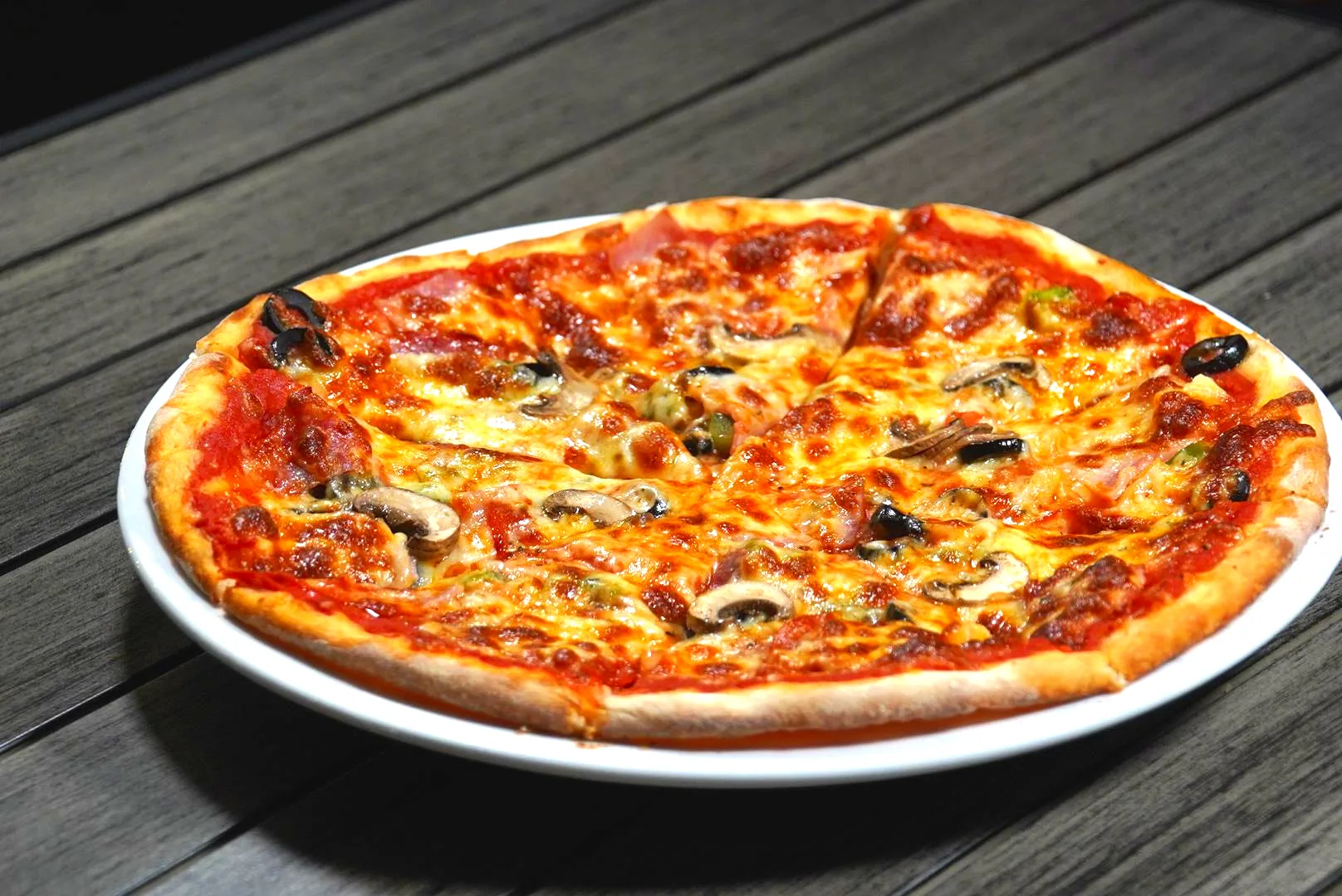 From a Mother's Dream to Your Table: Gecko's Legendary Wood-Fired Pizza