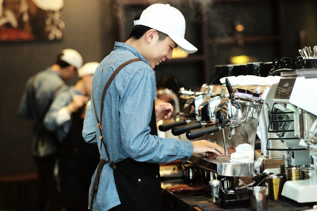 barista a coffee machine